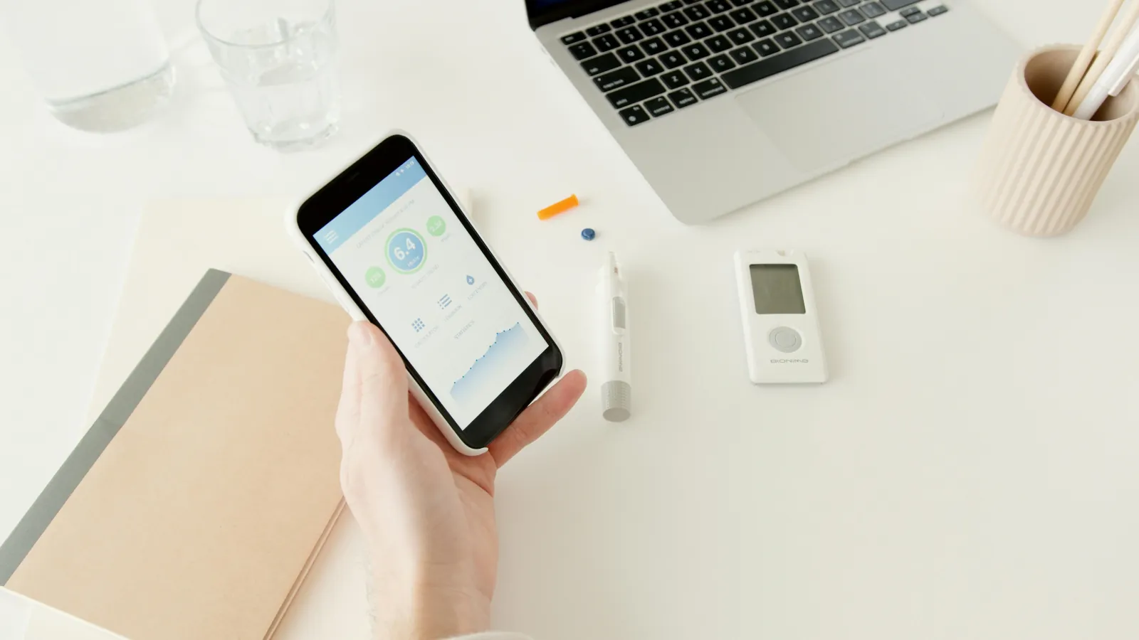 Doctor using a custom tablet app to review patient records in a clinic