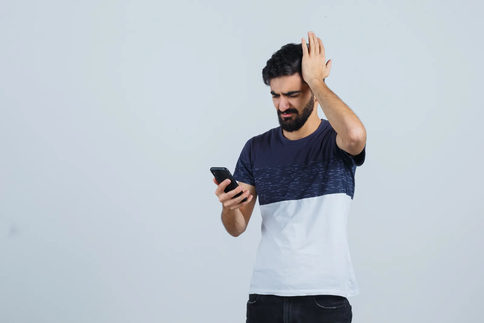 Frustrated person dealing with multiple smart home apps and incompatible devices
